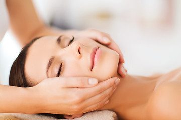 Image showing beautiful woman in spa salon having facial