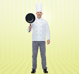 Image showing happy male chef cook holding frying pan