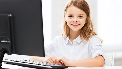 Image showing student girl with computer at school