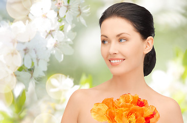 Image showing beautiful young woman with flowers