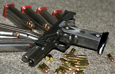 Image showing handgun and ammunition