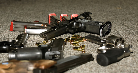 Image showing handguns and ammunition