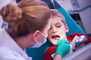 Image showing Young boy in a dental surgery