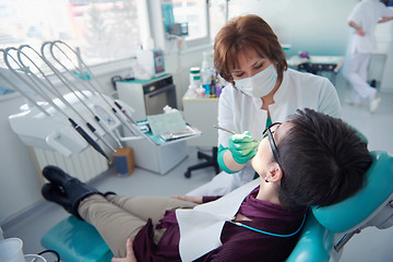 Image showing woman patient at the dentist