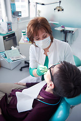 Image showing woman patient at the dentist