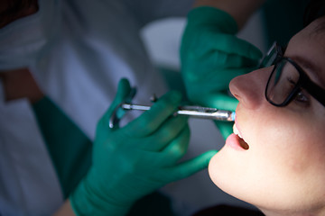 Image showing woman patient at the dentist