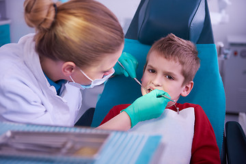 Image showing Young boy in a dental surgery