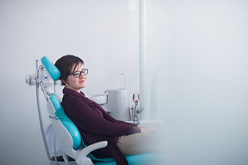 Image showing woman patient at the dentist