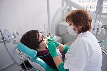 Image showing woman patient at the dentist