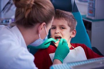 Image showing Young boy in a dental surgery