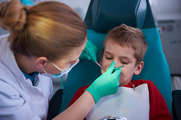 Image showing Young boy in a dental surgery