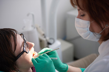 Image showing woman patient at the dentist