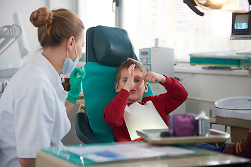 Image showing Young boy in a dental surgery