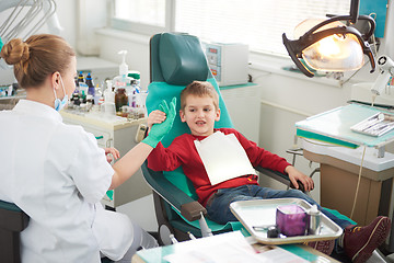 Image showing Young boy in a dental surgery