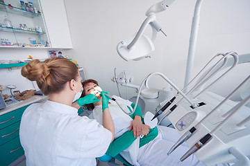 Image showing woman patient at the dentist