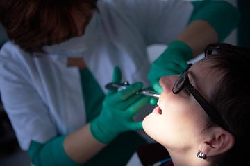 Image showing woman patient at the dentist