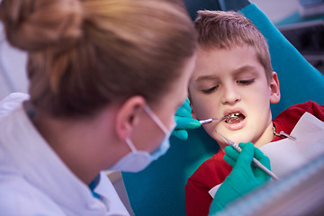 Image showing Young boy in a dental surgery