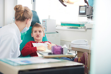 Image showing Young boy in a dental surgery