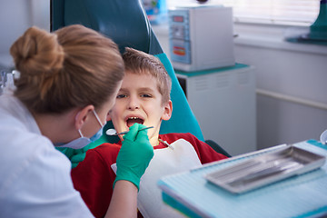 Image showing Young boy in a dental surgery