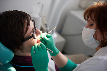 Image showing woman patient at the dentist