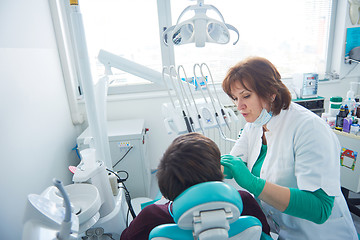 Image showing woman patient at the dentist