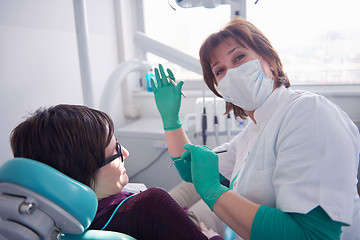 Image showing woman patient at the dentist