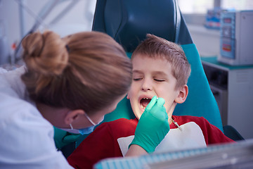 Image showing Young boy in a dental surgery