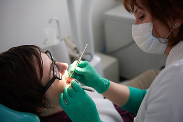 Image showing woman patient at the dentist