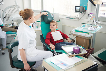 Image showing Young boy in a dental surgery