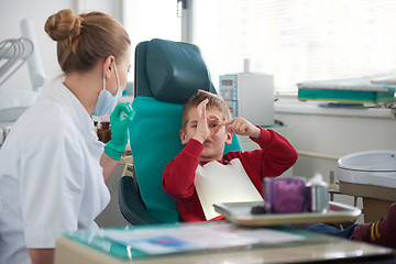 Image showing Young boy in a dental surgery