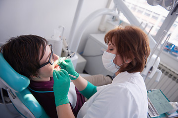 Image showing woman patient at the dentist