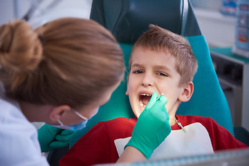 Image showing Young boy in a dental surgery