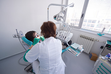 Image showing woman patient at the dentist