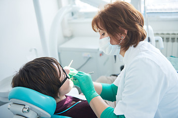 Image showing woman patient at the dentist