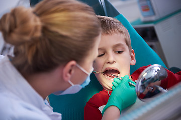 Image showing Young boy in a dental surgery