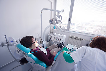 Image showing woman patient at the dentist