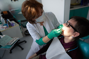 Image showing woman patient at the dentist