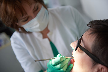 Image showing woman patient at the dentist