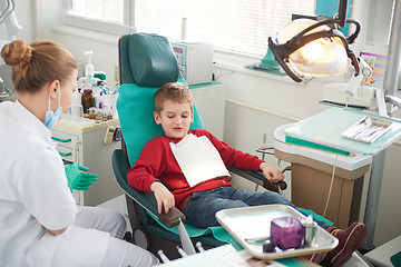 Image showing Young boy in a dental surgery