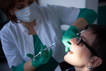 Image showing woman patient at the dentist