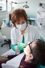 Image showing woman patient at the dentist