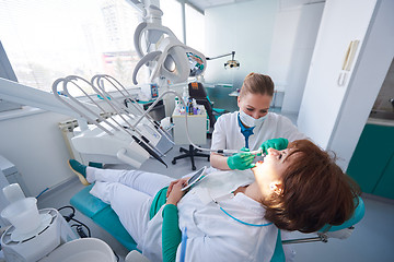 Image showing woman patient at the dentist