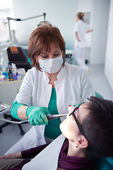 Image showing woman patient at the dentist