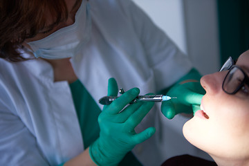 Image showing woman patient at the dentist