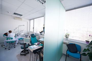 Image showing woman patient at the dentist