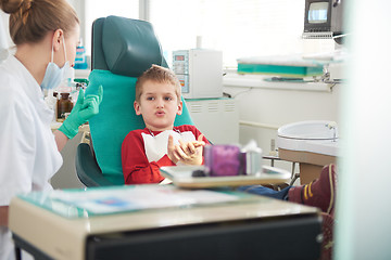 Image showing Young boy in a dental surgery