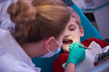 Image showing Young boy in a dental surgery