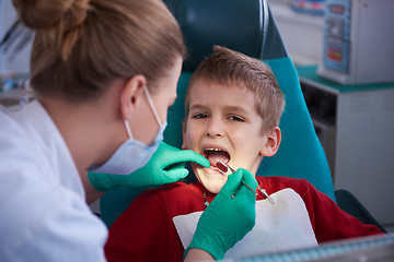 Image showing Young boy in a dental surgery