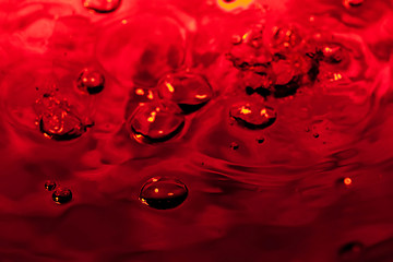 Image showing red abstract background with water drops