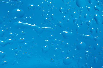 Image showing blue abstract background with water drops